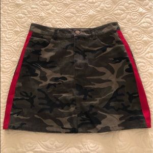 Camo jean skirt with red stripe.